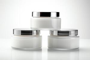 3D rendering of a. The is white and has a silver lid. The is sitting on a white background. There are threes in the image, stacked on top of each other. photo