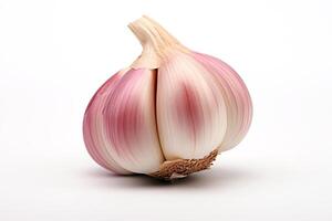 A photo of a single garlic bulb. The bulb is white with some purple skin remaining.