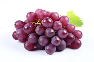 A cluster of ripe, plump, juicy red grapes, with a few green leaves, isolated on a white background. photo