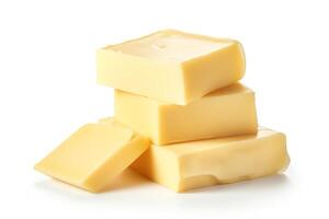 A block of yellow cheese on a white background. photo