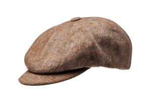 Flat cap in tweed fabric, stylish herringbone pattern, angled front view, isolated on a white background, highquality image. photo