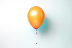 Take a picture of a single, orange balloon floating in the air against a white background. The balloon should be perfectly centered in the frame. photo