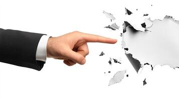 A business concept image shows a hand in a suit pointing at torn paper, symbolizing breakthrough and innovation. The minimalist, abstract design emphasizes creativity, disruption, and modern corporate photo
