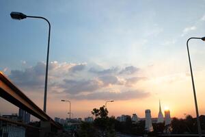 dark blue cloud with white light sun set sky background and city light midnight evening time photo