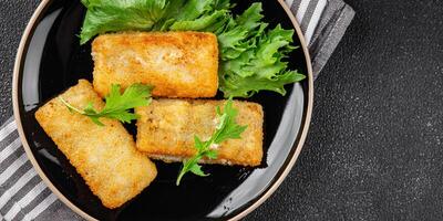 fish sticks fish in batter fresh meal food snack on the table copy space food background rustic top view Pescetarian diet photo