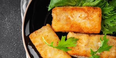fish sticks fish in batter fresh meal food snack on the table copy space food background rustic top view Pescetarian diet photo