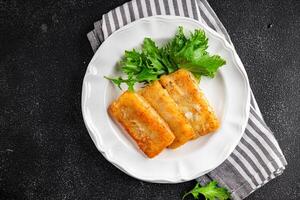 fish sticks fish in batter fresh meal food snack on the table copy space food background rustic top view Pescetarian diet photo