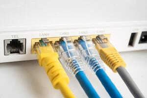 Ethernet cable with wireless router connect to internet service provider internet network. photo