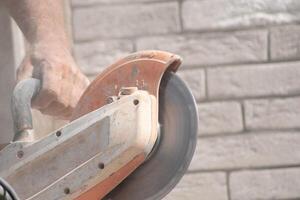 motion blur working concrete saw for sawing bricks of the right size, using technologies, High quality photo