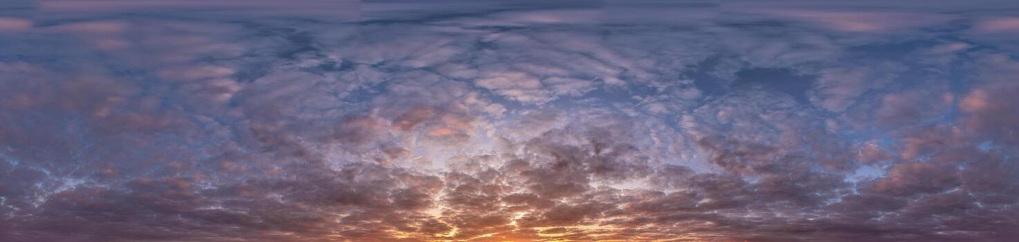 Golden sunset sky panorama Seamless spherical equirectangular 360-degree view with beautiful Stratocumulus clouds, setting sun - for use in 3D graphics as a sky dome or post-processing of drone images photo
