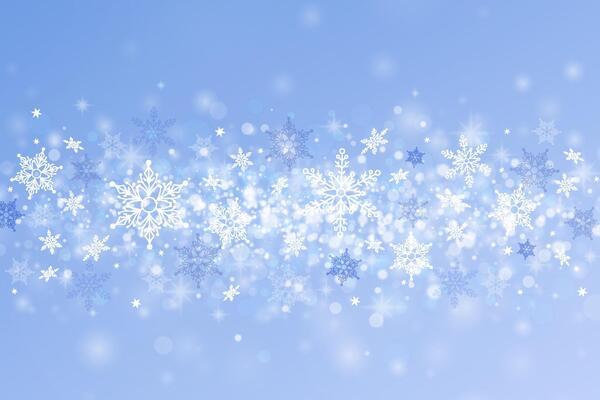 Snow background with bokeh effect with icy particles. Winter abstract blue background with snow