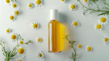 chamomile face scrub bottle with chamomile flowers on a white background in a spa setting. photo