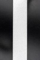 Template with the white center line on a dark green background. Vertical view photo