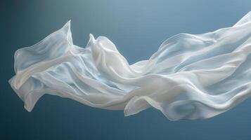 Delicate white silk satin cloths gracefully drift in the air, creating a tranquil atmosphere with their soft, flowing texture against a calming blue backdrop photo