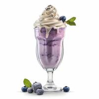 A tempting blueberry milkshake features a creamy texture topped with whipped cream, fresh blueberries, and mint leaves, all against a clean white backdrop photo