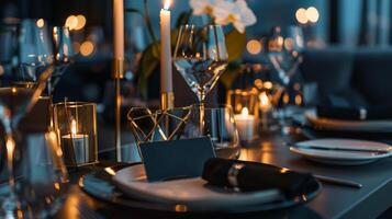 A beautifully arranged dinner table features sparkling glassware, flickering candles, and delicate flowers, creating an intimate ambiance perfect for a special occasion photo