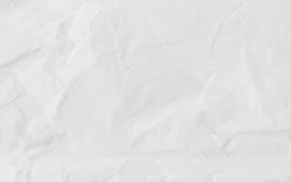 White crumpled craft paper texture as background. Light grey paper texture, Old vintage page or grunge vignette of old newspaper. Pattern rough art creased grunge letter with copy space for text. photo