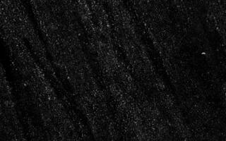 Abstract elegant dark black background illustration with vintage distressed grunge texture and white charcoal color paint. Dark grey textured concrete wall splash particle white fire effect. photo