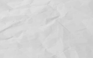 White crumpled craft paper texture as background. Light grey paper texture, Old vintage page or grunge vignette of old newspaper. Pattern rough art creased grunge letter with copy space for text. photo