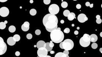 Loop white bokeh flow to top right on black background video
