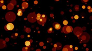 Loop glow orange red bokeh particles flow on black background video