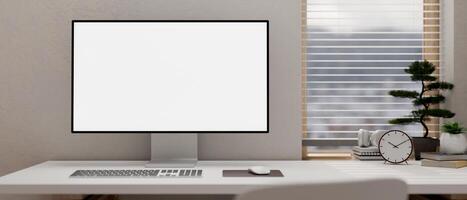 A white computer desk features a computer mockup in a minimal white room. photo