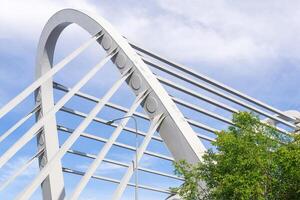 fragment of a metal bridge, concept of modern architecture, transport infrastructure photo