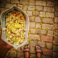 Indian snacks jhalmuri holding in hand photo