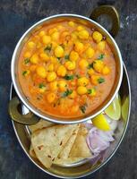 chole and paratha Indian dish photo
