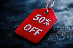 50 percent off tag hanging on a isolated background. black Friday sale concept. photo