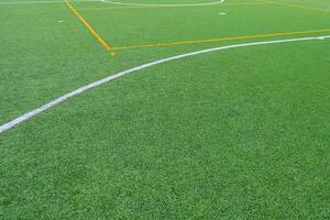 partial view of the center circle of an artificial turf soccer field photo