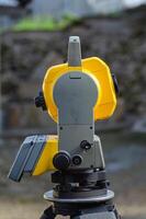side view of a total station, topographic survey instrument photo