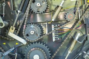 detail of the gears of an agricultural machinery, mechanical concept photo