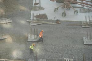 workers are working on large construction sites and many cranes are working in the, Industry new building business. photo