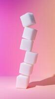 A stack of crystal sugar cube balancing standing concept solid background photo