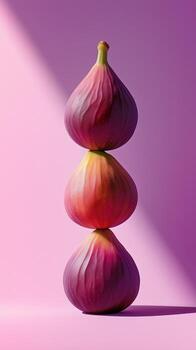 A stack of fig fruit balancing on top with solid background photo
