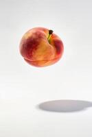A peach is floating in the air photo