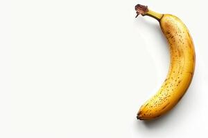 A banana is shown on a white background photo