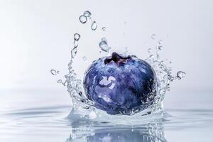 Blueberry splash with water on white background photo