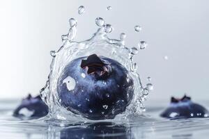 Blueberry splash with water on white background photo