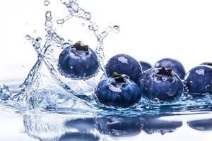 Blueberries are splashing into the water photo