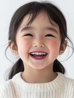 A little girl is smiling and laughing photo
