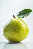 A pear with a leaf photo