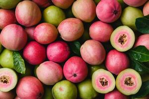 A pile of ripe guava fruit photo