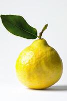 A lemon with a leaf on top photo