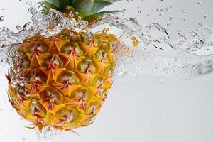 A pineapple is being splashed with water photo