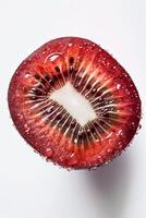Kiwi fruit with water droplets on white background photo