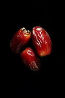 Three dates on a black background photo