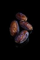 A group of dates on a black background photo