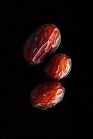 Three dates on a black background photo